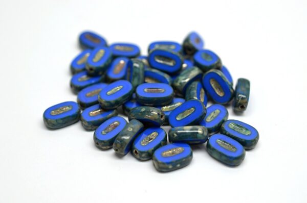 TCB Flat Oval Beads 10x6mm - Image 1